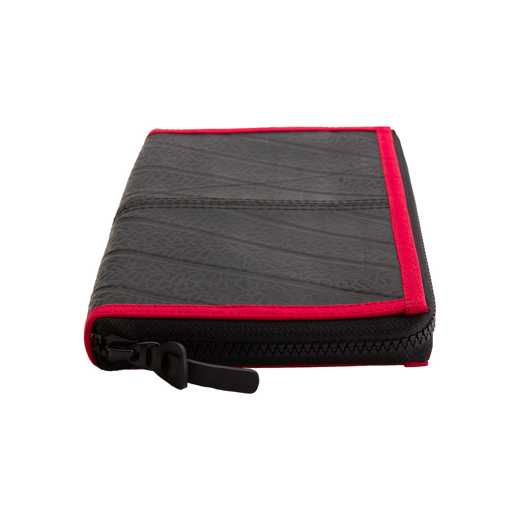 Paguro Upcycle black zip travel pouch with red trim made from recycled rubber travel organiser for toiletries