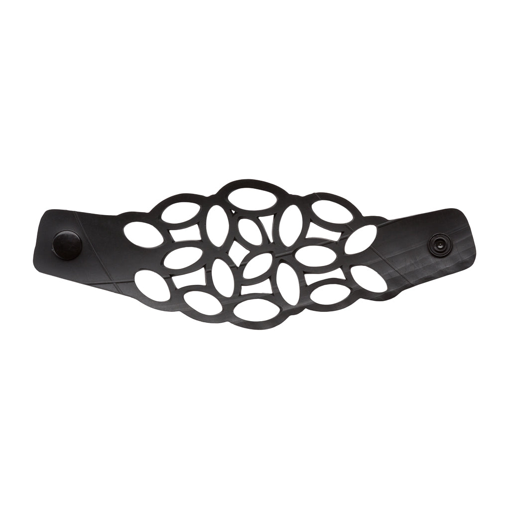 Paguro Upcycle recycled rubber bracelet with black openwork design and snap button closure