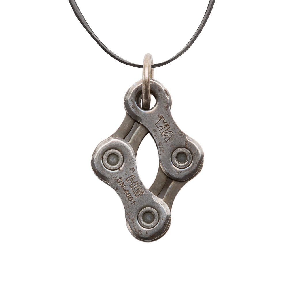 Paguro Upcycle recycled bike chain pendant necklace on a black inner tube cord for an eco-friendly accessory