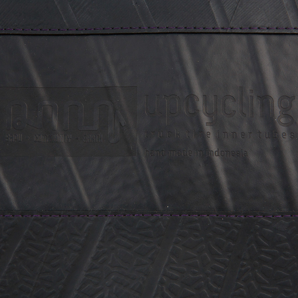 Paguro Upcycle recycled rubber notebook holder black folder with textured surface and embossed logo