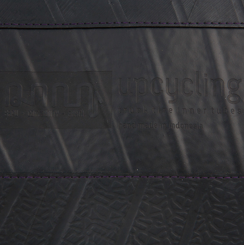 Paguro Upcycle recycled rubber notebook holder black folder with textured surface and embossed logo
